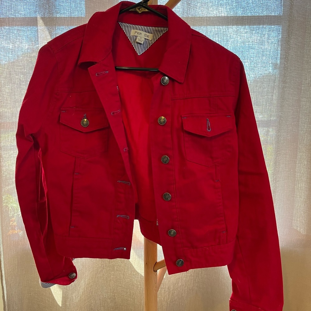 Standout in the crowd with your red jacket